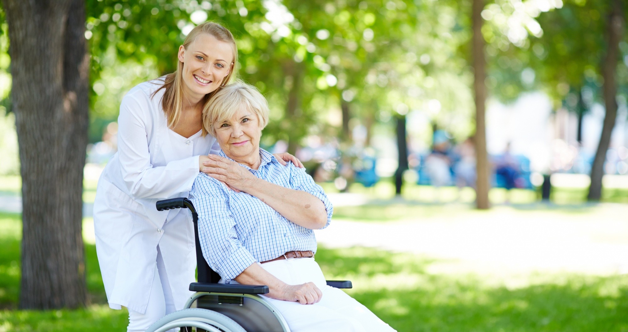 Elderly care recipient smiling with caregiver